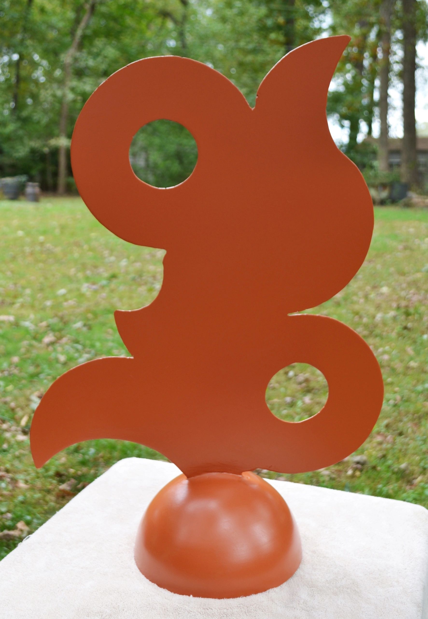 Cinnamon Bird, metal sculpture by Brian Kirk