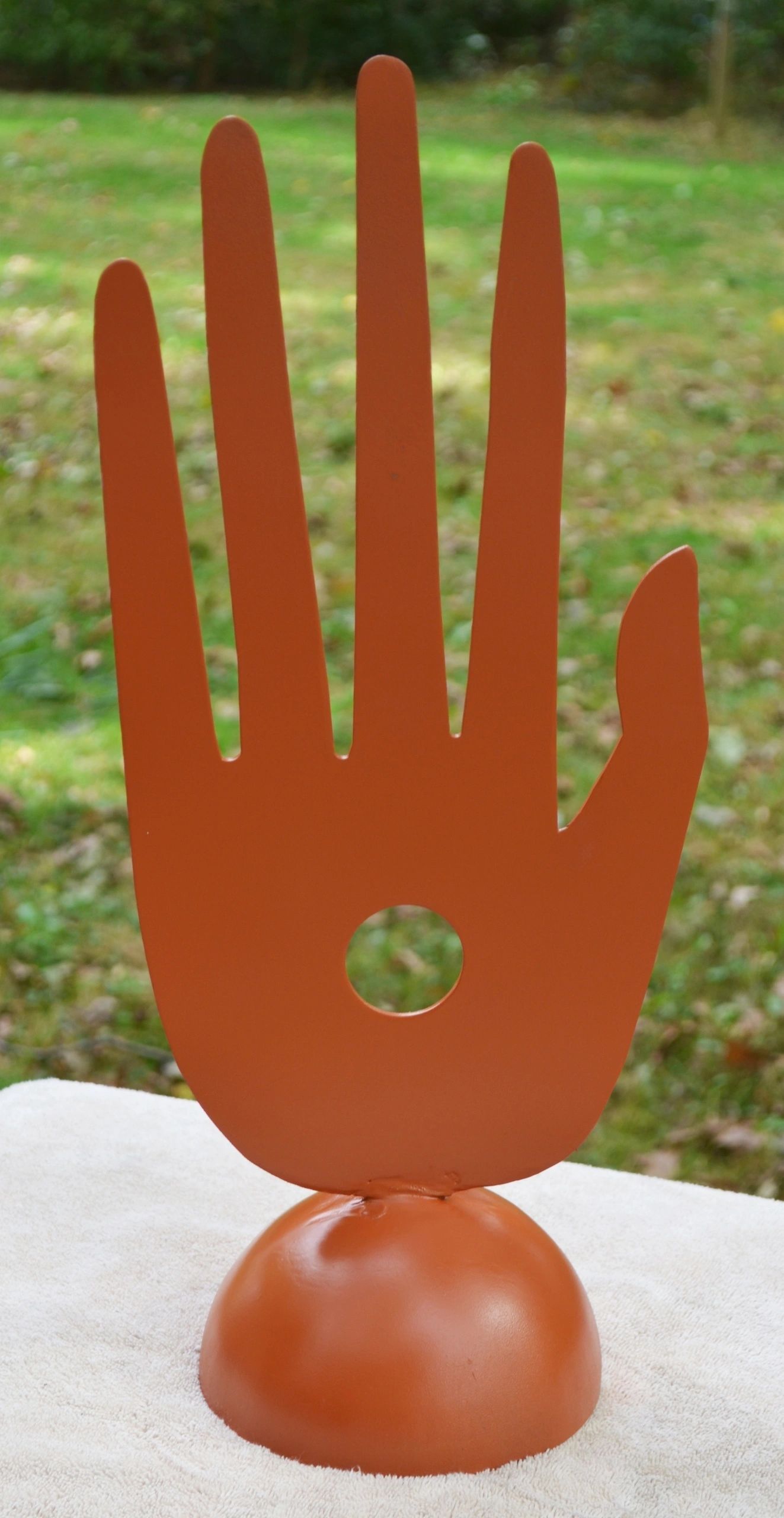 Cinnamon Hand, metal sculpture by Brian Kirk