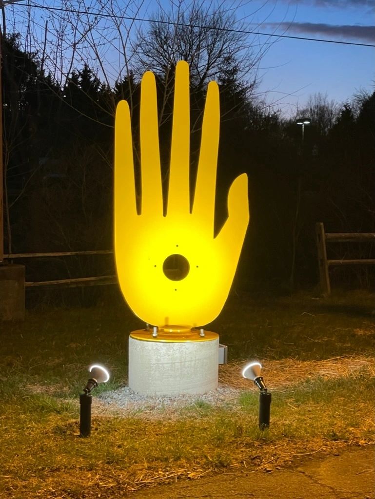 Hand with Directions, metal sculpture by Brian Kirk