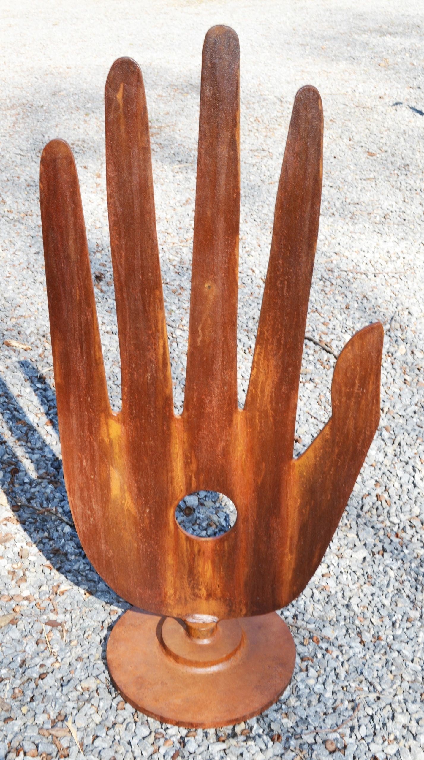 Votive Hand, metal sculpture by Brian Kirk