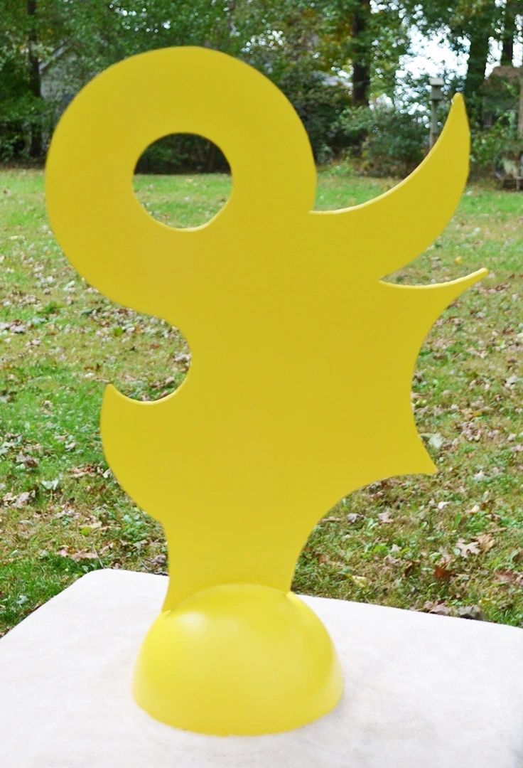 Yellow Bird, metal sculpture by Brian Kirk